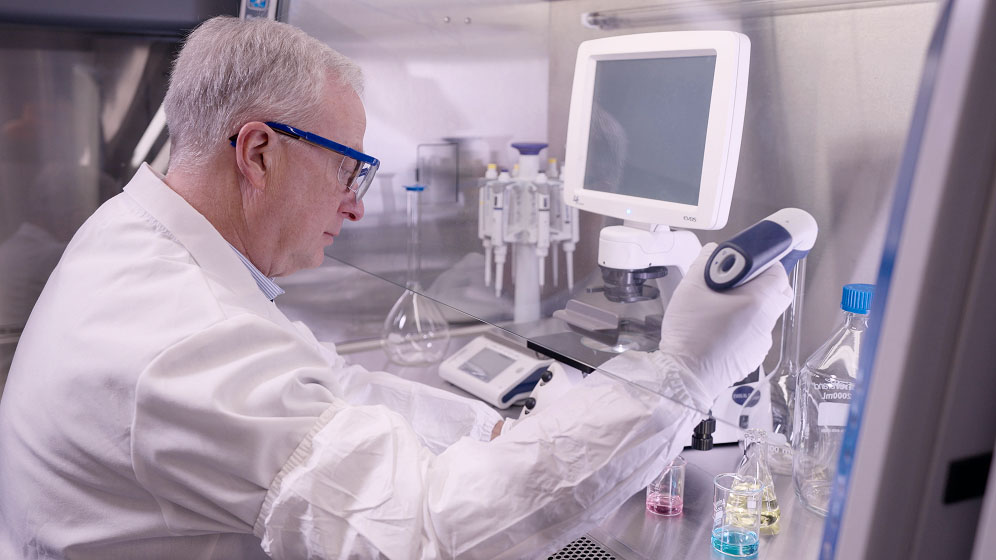 Dr. Lynch tests product with laboratory equipment