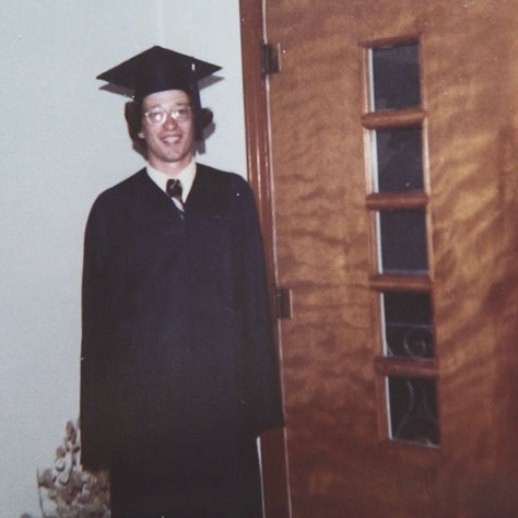 Dr. Lynch in graduation robes